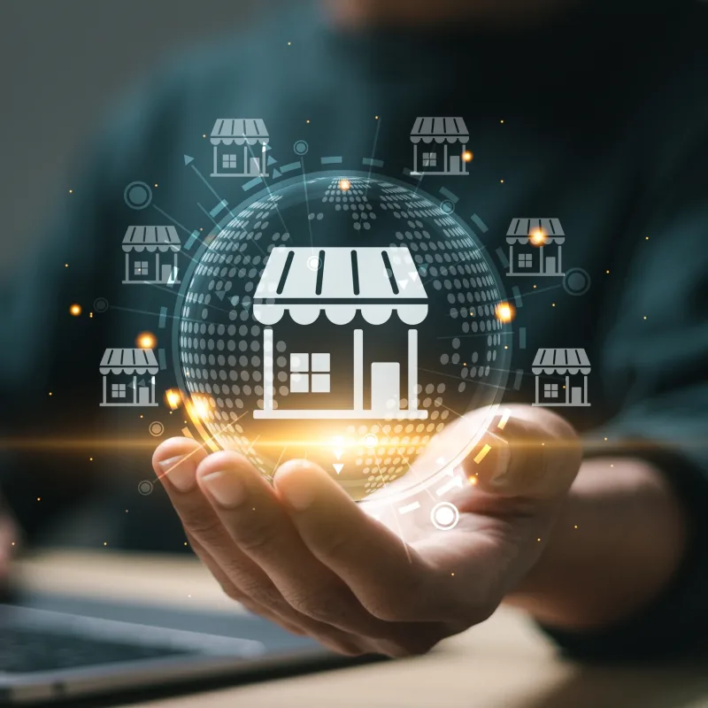 Franchise business concept, Businessman hold virtual globe with franchise business icon for growth, franchise marketing system in global business network, brand building and modern technology.